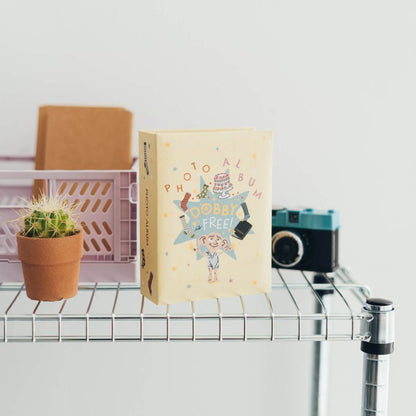 Hario Poterio – Dobby Free kolekcijos nuotraukų albumas, skirtas 100 nuotraukų, 10x15 cm
